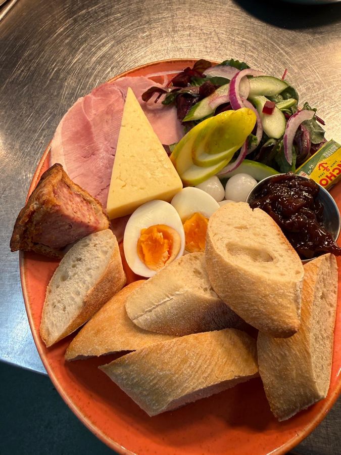 Ploughman's with ham, cheddar, pork pie, egg and crusty bread