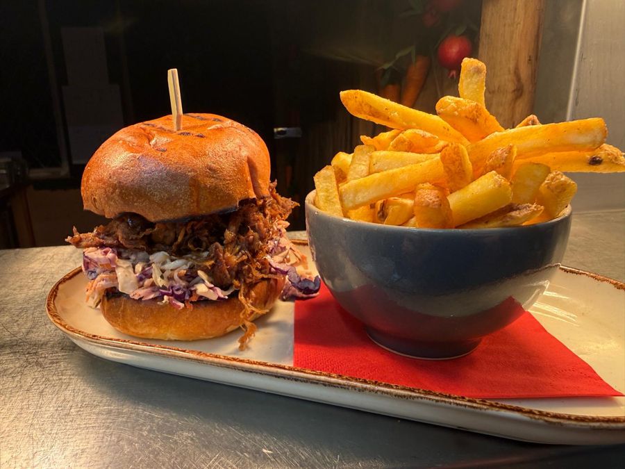 Pulled pork burger with slaw and fries
